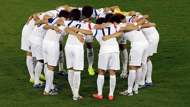 The South Korean team huddles prior to the group H World Cup soccer match between South Korea and Russia.