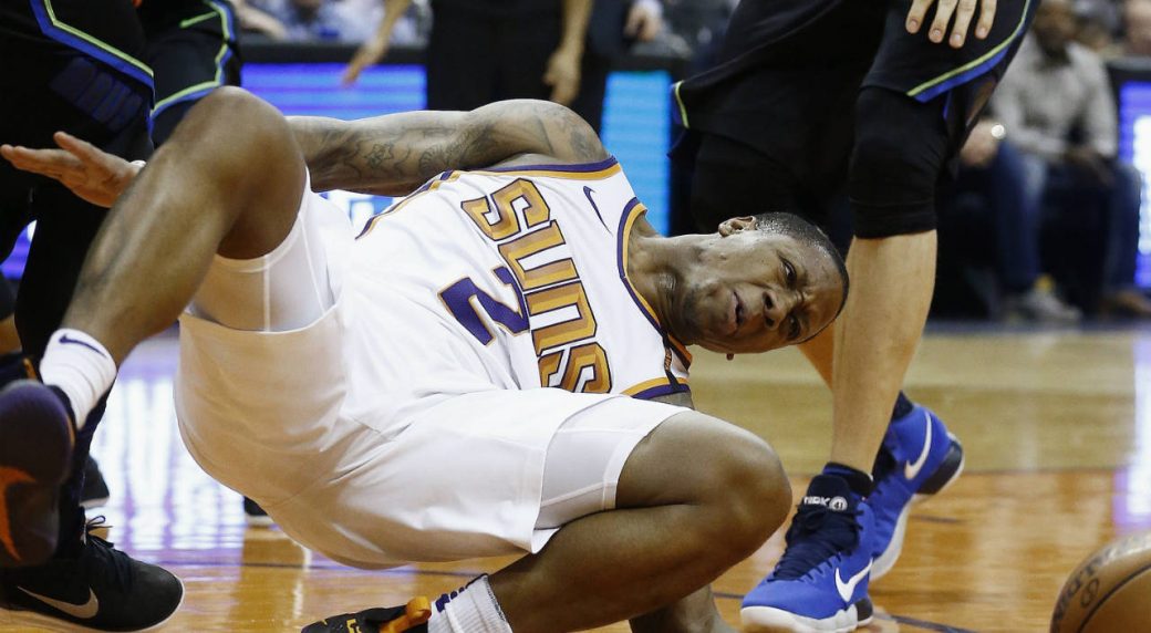 Suns' Isaiah Canaan stretchered off after gruesome left ankle injury ...